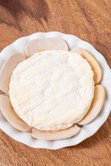 French cheeses collection, Saint-Felicien cow's milk cheese with white mold from Rhone-Alpes region of France