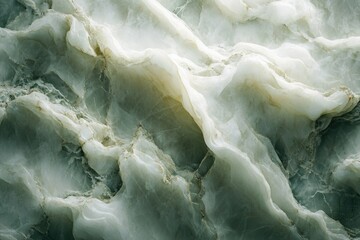 Obraz premium Close-up view of a swirling, textured green and white onyx stone, exhibiting natural formations and patterns.