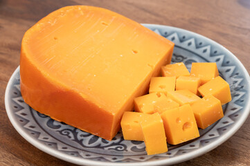 Cheese collection, Dutch ripe hard chees made from cow milk in the Netherlands in piece and in blocks close up