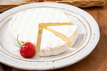 French soft cheeses collection, creamy cow's milk cheese brie with white mold, France