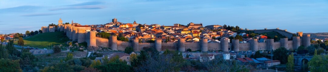 Fototapeta premium Panoramic view of the Walls and the City of Avila in the province of Avila. World Heritage Site. UNESCO. Castile and León. Spain. Europe