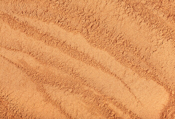 Incense - chandan or sandalwood powder as background, top view. Crushed sandalwood.