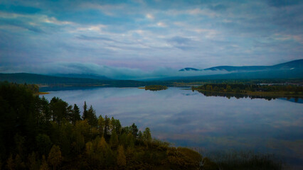 Obraz premium Morning Reflection on Äkäslompolo Lake, Lapland Finland