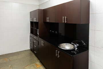 Compact Kitchenette with Microwave, Sink and Storage Cabinets