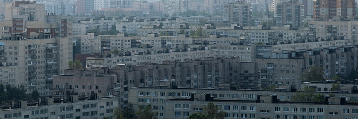 View of the southern part of Saint Petersburg with rows of Soviet-era apartment buildings, concrete housing complexes and urban density.