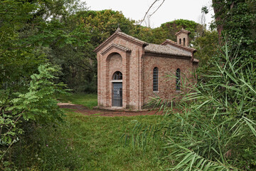 Ravenna, Emilia Romagna, Italy: the small church Oratorio Madonna del Pino in the San Vitale pine forest, Po Delta Park