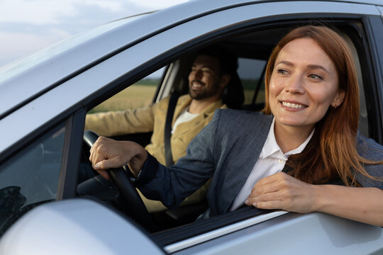 Female driver enjoying ride with friend