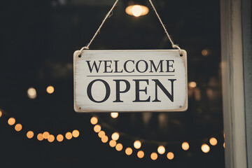 Open for Business: A rustic Welcome Open sign hangs invitingly in a storefront window, illuminated by soft, warm lights and promising new beginnings. 