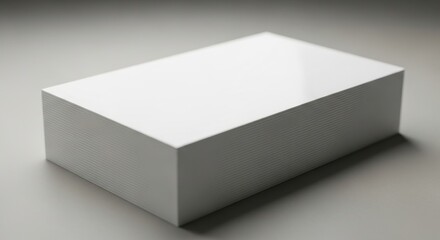 Fototapeta premium Clean Blank White Rectangular Box Packaging Mockup on a Light Gray Surface with Subtle Shadows