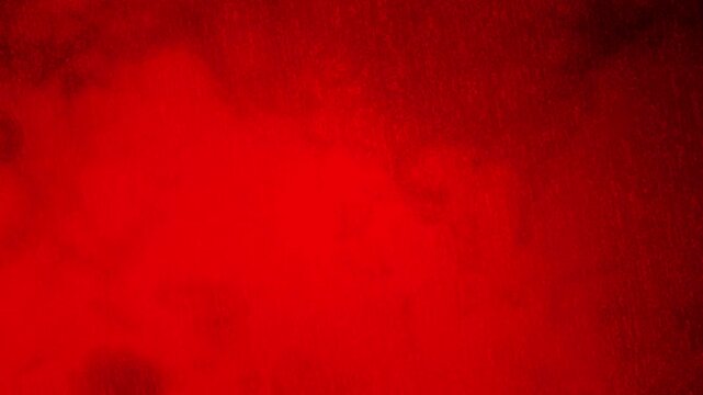 Bold red background with textured edges, perfect for design, advertising, or a vibrant backdrop