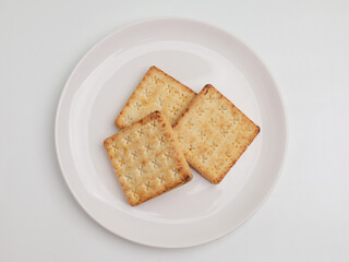 Crunchy crackers on white background