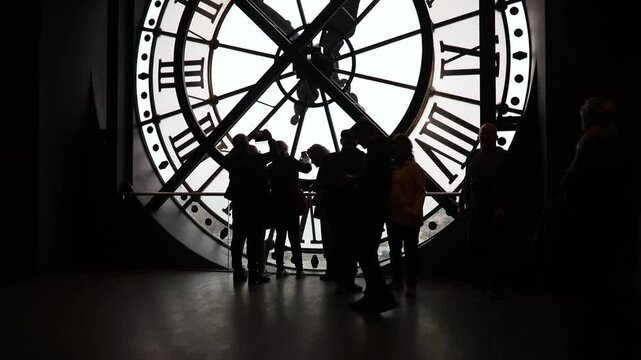 Unrecognizable people overlooking Paris.