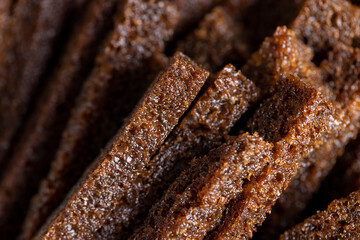 fried bread pieces until crisp in sunflower oil with spices, delicious crispy rye bread croutons for cheese sauce