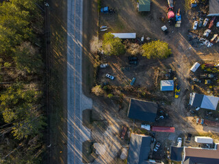 Aerial top down car graveyard winter after Hurricane Helene in Dearing McDuffie Augusta Georgia
