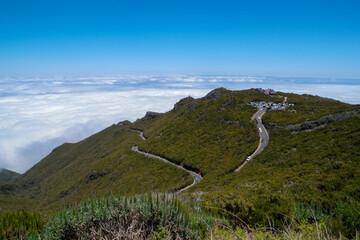 Exploring Vereda do Pico Ruivo, Madeira with stunning mountain views and vibrant skies