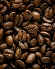 Top down view of a pile of fresh coffee beans.