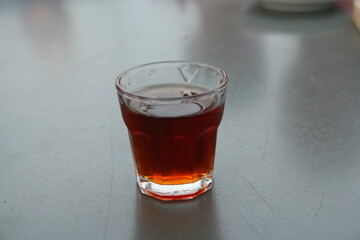 Tasting traditional cherry liqueur in Belem, Lisbon, Portugal during a leisurely afternoon
