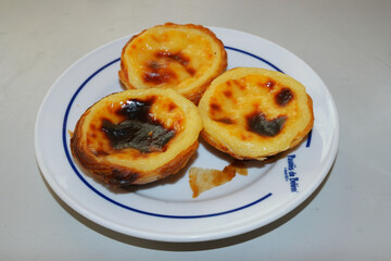Delicious pasteis de Belem served in Lisbon’s Belem district showcasing Portuguese culinary tradition