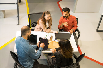 Multiracial group of people working at office.