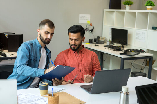 Multiracial group of people working at office.