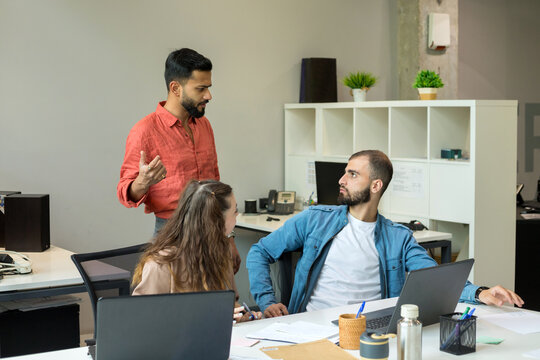 Multiracial group of people working at office.