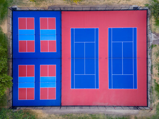 Vibrant drone aerial view of pickleball and tennis courts