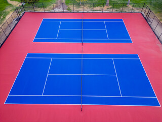 Vibrant drone aerial view of pickleball and tennis courts