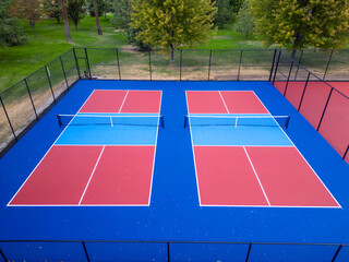 Vibrant drone aerial view of pickleball and tennis courts