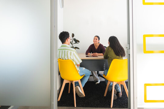 Team Meeting with Human Resources Agent in Office