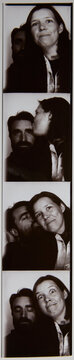 Photobooth image of a loving couple