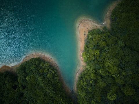 Aerial View of Island in Blue Lake
