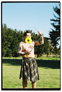 Playful Diabolo Trick by Non-binary Juggler