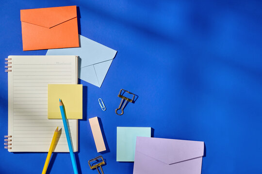 Colorful Office Supplies on a Blue Background for Creative Projects