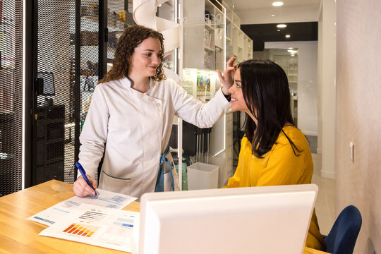 Friendly consultation between pharmacist and customer