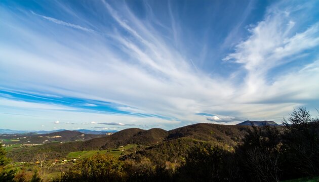 Panoramic view of hills and clouds