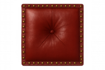 Red leather square cushion with golden studs isolated on transparent background, perfect for interior design projects