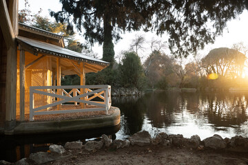 Crystal palace shining at sunset in retiro park, madrid