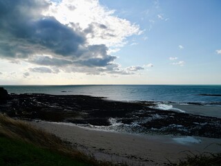 Naklejka premium Sunset over the North Atlantic Ocean. Granville, Lower Normandy, France