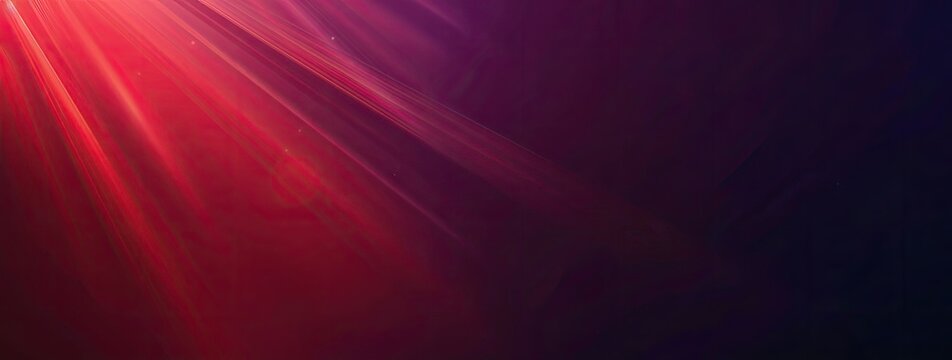 Abstract image of red and purple light rays emanating from the upper left corner, fading into a dark background.  The rays create a dramatic, almost theatrical effect