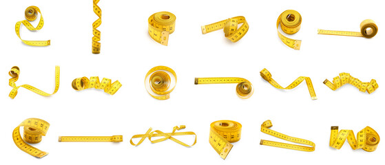 Set of yellow measuring tape on white background