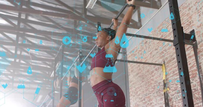 woman approaching pull-up rack, performing L-sit pull-ups for training with blue fitness icons