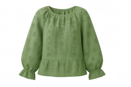 Green blouse displaying intricate floral embroidery, photographed in studio setting against transparent backdrop, highlighting fashion design details