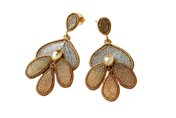 Delicate, layered, gold-toned earrings with textured, cascading, petal-like forms in muted beige and silver tones