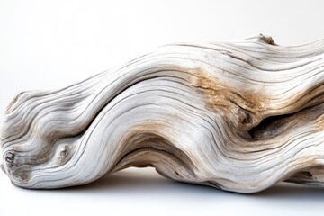 A weathered piece of driftwood with swirling grain patterns and variations in color, showcasing the beauty of nature's artistry.