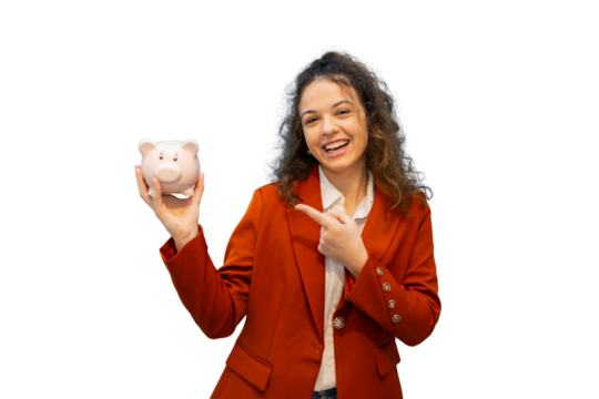 Cheerful businesswoman pointing at piggy bank promoting saving money, with transparent background for easy compositing