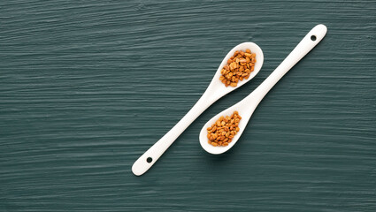 Methi Dana - Dried organic fenugreek seeds in two spoons