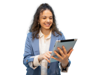 Businesswoman smiling confidently while using a digital tablet, showcasing her professionalism and connection in a modern office setting