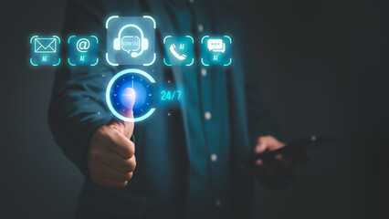 Businessman showing thumbs up with glowing 24/7 AI customer service icons, representing chatbot support, call center automation, email, phone, and live chat assistance available anytime.