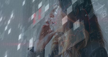 Holding smartphone, businesswoman wearing dark blazer in studio, with digital data graphics overlay