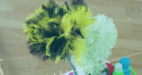 Container holding brush heads and bottles with colored caps sitting on countertop, numeric overlay